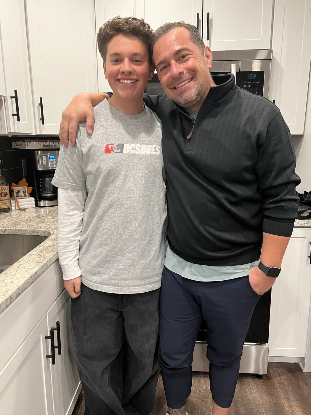 Johnny with his son in the kitchen where ChefsPantry started